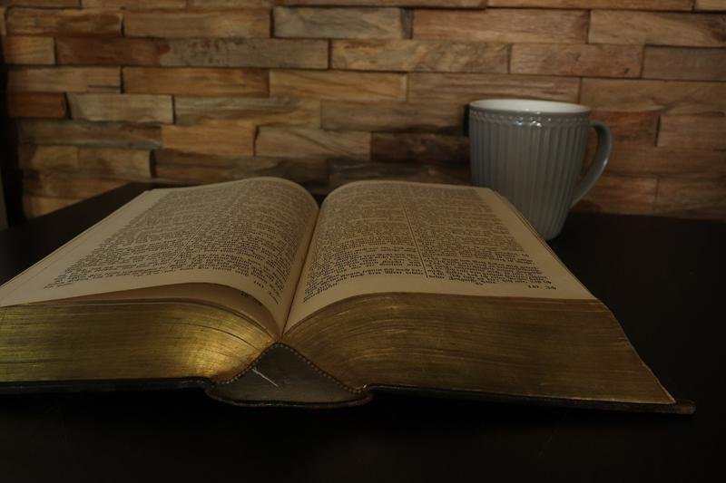bible, coffee, a book
