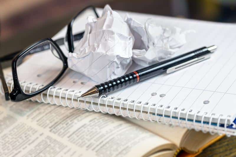 a book, notepad, paper