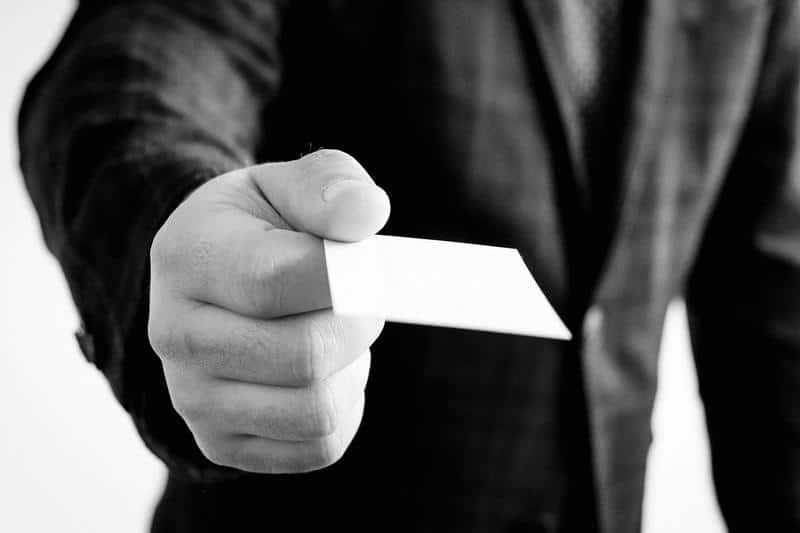 business card, hand, jacket