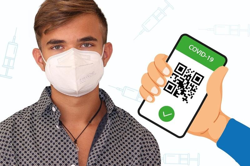 man, mask, vaccination certificate
